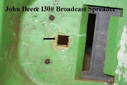 Plastic seal hole  in bottom of John Deere Spreader