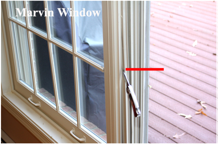 Marvin Wood Double Hung Windows - Shows snapping hard edge of vinyl track into wood frame