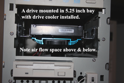 Shows how hard drive with cooler mounts into mid-tower