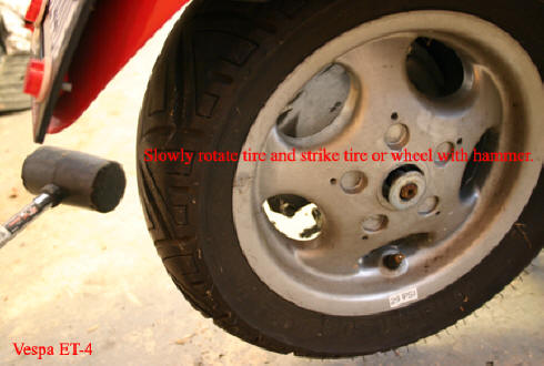 Vespa ET-4 rear tire replacement.